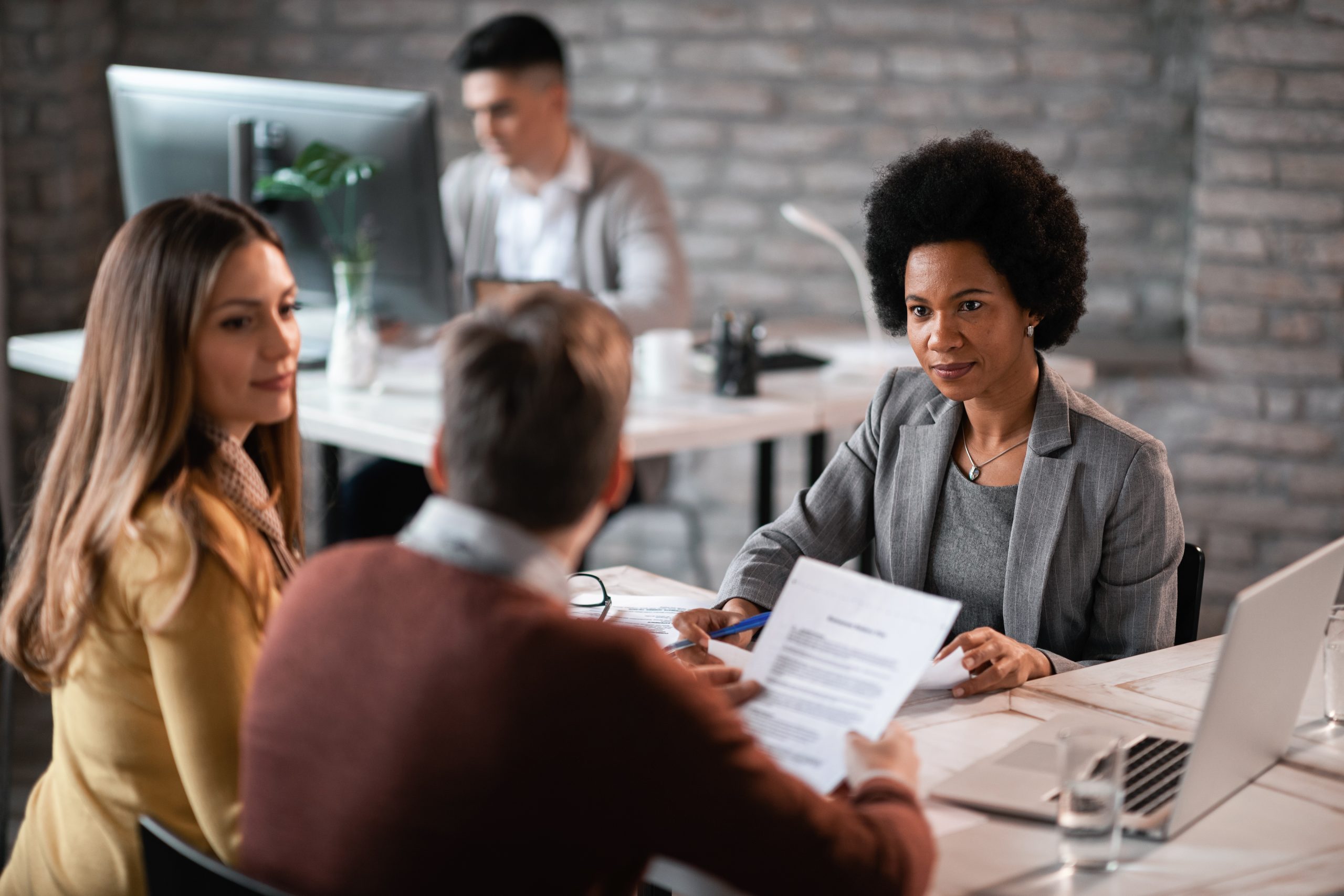 Business leaders receiving strategic executive and investment advisory